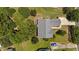 Birds eye view of a well maintained home and yard, with a private driveway and mature landscaping at 113 Kelly Ln, Clayton, NC 27520