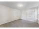 Neutral bedroom with white doors, neutral carpet, and a light, airy feel at 1209 Waterford Green Dr Dr, Apex, NC 27502