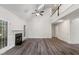 Spacious living room with vaulted ceiling, fireplace, and modern flooring at 1209 Waterford Green Dr Dr, Apex, NC 27502