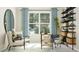 Bright and airy office featuring natural light from a large window and comfortable seating at 1221 Coral Cay Bnd, Wake Forest, NC 27587