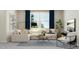 Bright living room with cozy sectional sofa, large window, and stylish decor at 1221 Coral Cay Bnd, Wake Forest, NC 27587