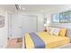 Comfortable bedroom featuring a closet, large window, and modern furnishings at 1309 Hudson Ave # D14, Durham, NC 27705