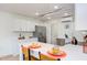 Modern kitchen with white cabinetry, stainless steel appliances, and central island at 1309 Hudson Ave # D5, Durham, NC 27705