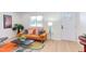 Inviting living room features a comfortable sofa, modern decor, and ample natural light at 1309 Hudson Ave # D5, Durham, NC 27705