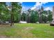 Backyard with shed and trampoline at 132 Ironwood Ln, Clayton, NC 27520