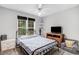 Bedroom with ceiling fan, window, and an abundance of natural light at 132 Ironwood Ln, Clayton, NC 27520