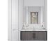 Modern bathroom vanity with gray cabinets, white countertops, and framed mirror at 17 Runneymede Pl, Smithfield, NC 27577