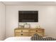 Neutral bedroom offering a dresser with drawers and a TV at 17 Runneymede Pl, Smithfield, NC 27577