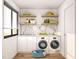 Bright laundry room featuring modern appliances, shelving, and natural light from a large window at 17 Runneymede Pl, Smithfield, NC 27577