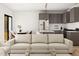 Spacious living room area connected to modern kitchen and stylish dining area at 17 Runneymede Pl, Smithfield, NC 27577