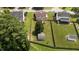 An aerial view of the property highlighting the backyard, patio and sheds at 1713 Mclaurin Ln, Fuquay Varina, NC 27526