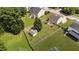 An aerial view of the property highlighting the backyard, patio and sheds at 1713 Mclaurin Ln, Fuquay Varina, NC 27526