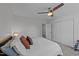 Bedroom featuring carpet floors, ceiling fan, and a large closet at 1713 Mclaurin Ln, Fuquay Varina, NC 27526