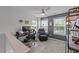 Home office featuring a modern workspace with a large desk and a comfortable reclining chair at 1713 Mclaurin Ln, Fuquay Varina, NC 27526