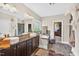 Elegant bathroom boasting double sinks, a soaking tub, and modern fixtures with stylish decor at 1806 Pattersons Mill Rd, Durham, NC 27703
