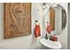 Stylish half bathroom features a unique vanity and decorative mirror at 1806 Pattersons Mill Rd, Durham, NC 27703
