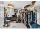 Spacious walk-in closet providing ample storage with organized racks and shelving, and great lighting at 1806 Pattersons Mill Rd, Durham, NC 27703
