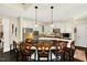 Modern kitchen featuring a large island with bar seating and stainless steel appliances at 1806 Pattersons Mill Rd, Durham, NC 27703