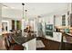 Contemporary kitchen with a center island, stainless appliances, and open layout to other living spaces at 1806 Pattersons Mill Rd, Durham, NC 27703