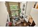 Sun-drenched living room boasting high ceilings, large windows, fireplace, and hardwood floors at 1806 Pattersons Mill Rd, Durham, NC 27703