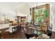 Bright living room with high ceilings, large windows, and an open-concept kitchen at 1806 Pattersons Mill Rd, Durham, NC 27703