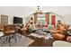 Comfortable living room with hardwood floors, stylish seating, bar and an abundance of natural light at 1806 Pattersons Mill Rd, Durham, NC 27703