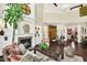 Open-concept living area with fireplace and stylish furnishings at 1806 Pattersons Mill Rd, Durham, NC 27703
