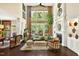Spacious living area featuring a fireplace, high ceilings and natural lighting at 1806 Pattersons Mill Rd, Durham, NC 27703