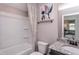 Functional bathroom features a shower-tub combo and granite vanity at 189 Churchill Way, Clayton, NC 27520