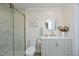 Modern bathroom featuring a glass-enclosed shower and updated vanity at 1964 Wellington Rd, Burlington, NC 27217