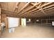 Outbuilding featuring exposed wooden beams and framing with an open layout, perfect for a workshop or storage area at 1964 Wellington Rd, Burlington, NC 27217