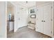 Warm and inviting entryway with stylish decor and ample natural light at 1985 Firenza Dr, Apex, NC 27502