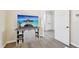 Functional cabinet with shelving and adjacent doorway showcasing home's open layout at 1985 Firenza Dr, Apex, NC 27502