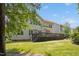 Home's backyard features a raised wooden deck at 203 Pathwood Ln, Durham, NC 27705