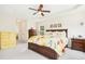 Bright and open main bedroom, complete with dresser, lamps, and natural light at 203 Pathwood Ln, Durham, NC 27705