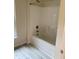 Bright white bathtub and shower combination at 206 E Silver Belle Dr, Zebulon, NC 27597