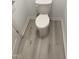 Bathroom with modern white toilet and neutral flooring at 206 E Silver Belle Dr, Zebulon, NC 27597