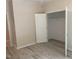 Bedroom with closet and neutral walls at 206 E Silver Belle Dr, Zebulon, NC 27597