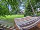 Picture of hammock on wooded lot with home in the background at 218 Inwood Forest Dr, Raleigh, NC 27603