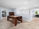 Finished basement with carpet and recreational area at 218 Inwood Forest Dr, Raleigh, NC 27603
