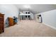 Unique bedroom with a suspended loft bed, study desk, and ample space, perfect for a creative retreat at 218 Inwood Forest Dr, Raleigh, NC 27603