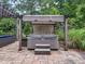 Backyard featuring a relaxing hot tub with pergola and inviting outdoor furniture at 218 Inwood Forest Dr, Raleigh, NC 27603