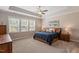 Spacious bedroom with trey ceilings, natural light, and modern furniture at 223 Chauncey Cir, Chapel Hill, NC 27516