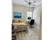 Cozy bedroom with a desk area, neutral walls, and a plush carpet, with a comfortable bed at 223 Chauncey Cir, Chapel Hill, NC 27516