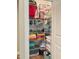 Organized linen closet featuring wire shelving, storage bins, and folded towels at 223 Chauncey Cir, Chapel Hill, NC 27516
