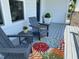 Charming front porch with seating and floral accents at 223 Chauncey Cir, Chapel Hill, NC 27516