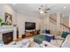 Inviting living room with modern fireplace, large sectional, and warm lighting creates a welcoming atmosphere at 223 Chauncey Cir, Chapel Hill, NC 27516