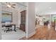 Open-concept living space flows into a modern kitchen, showcasing hardwood floors and natural light at 223 Chauncey Cir, Chapel Hill, NC 27516