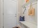 Mudroom with coat hooks, bench with storage, and a decorative pillow and bag at 223 Chauncey Cir, Chapel Hill, NC 27516