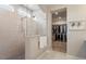 Walk-in shower with glass enclosure and tiled walls at 223 Chauncey Cir, Chapel Hill, NC 27516